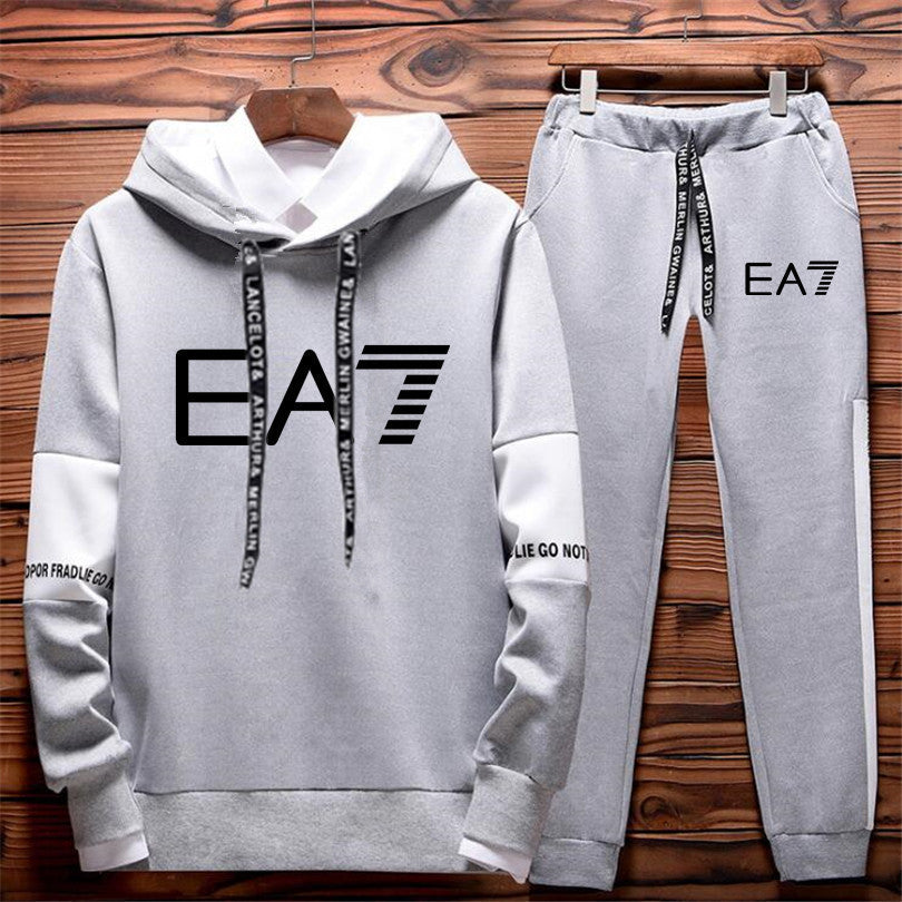 Hoodie and parts set with EA7 branding on the background
