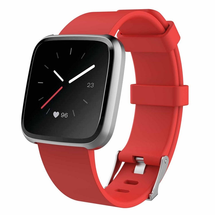 Smartwatch with a red band on a white background