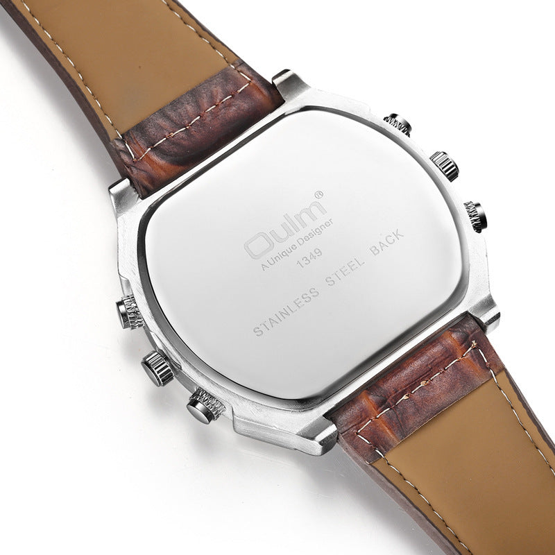 Close-up of a watch with a brown leather strap and silver case on a white background