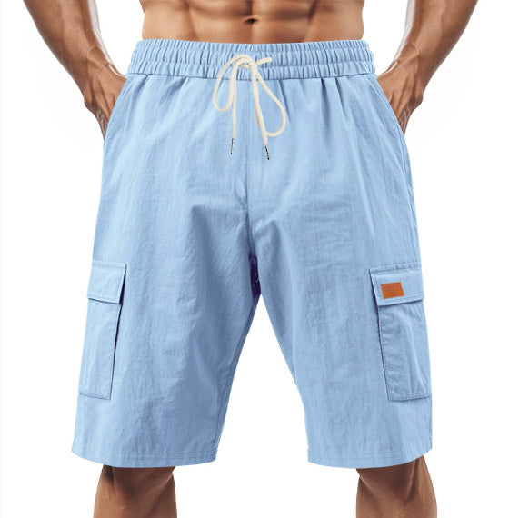 Light blue shorts with a drawstring on a white background