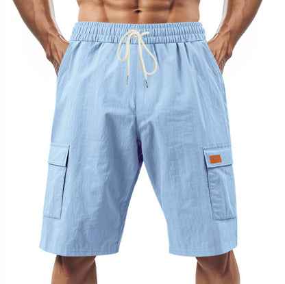 Light blue shorts with a drawstring on a white background