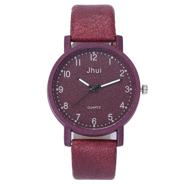 Purple watch with 'Jhui' branding on a white background