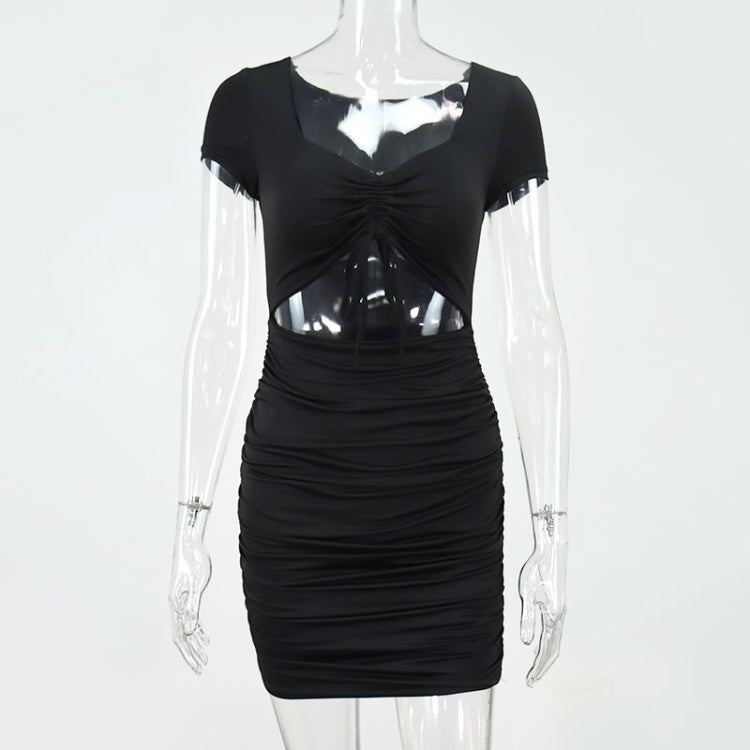 Black dress with sheer panels on a mannequin against a white background
