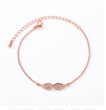 Rose gold bracelet on a white background