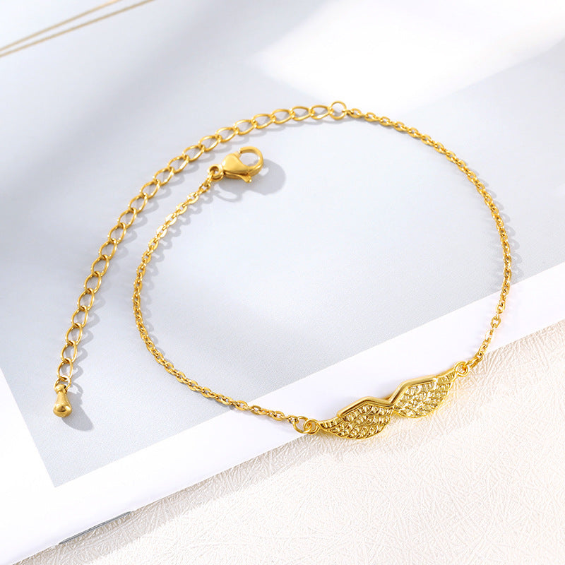 Gold bracelet on a white background