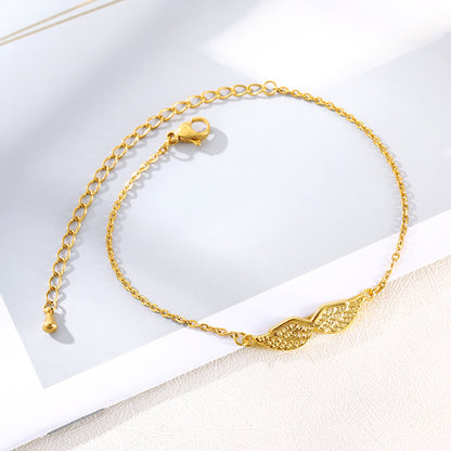 Gold bracelet on a white background