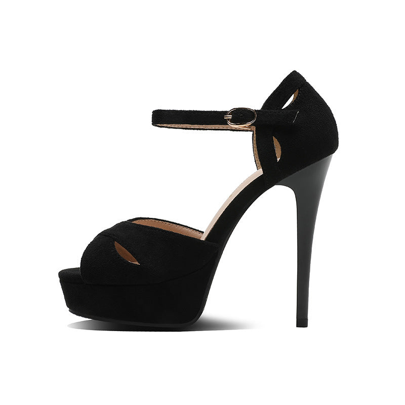 Black high-heeled shoe with cut-out design on a white background