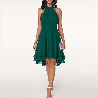 Green dress worn by a model on a white background