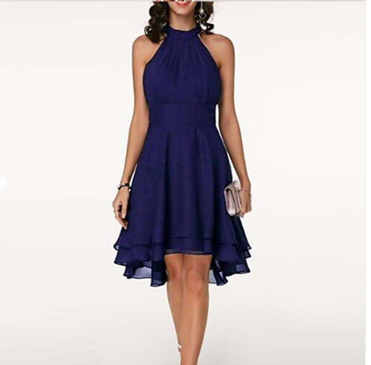 Navy blue halter neck dress on a white background