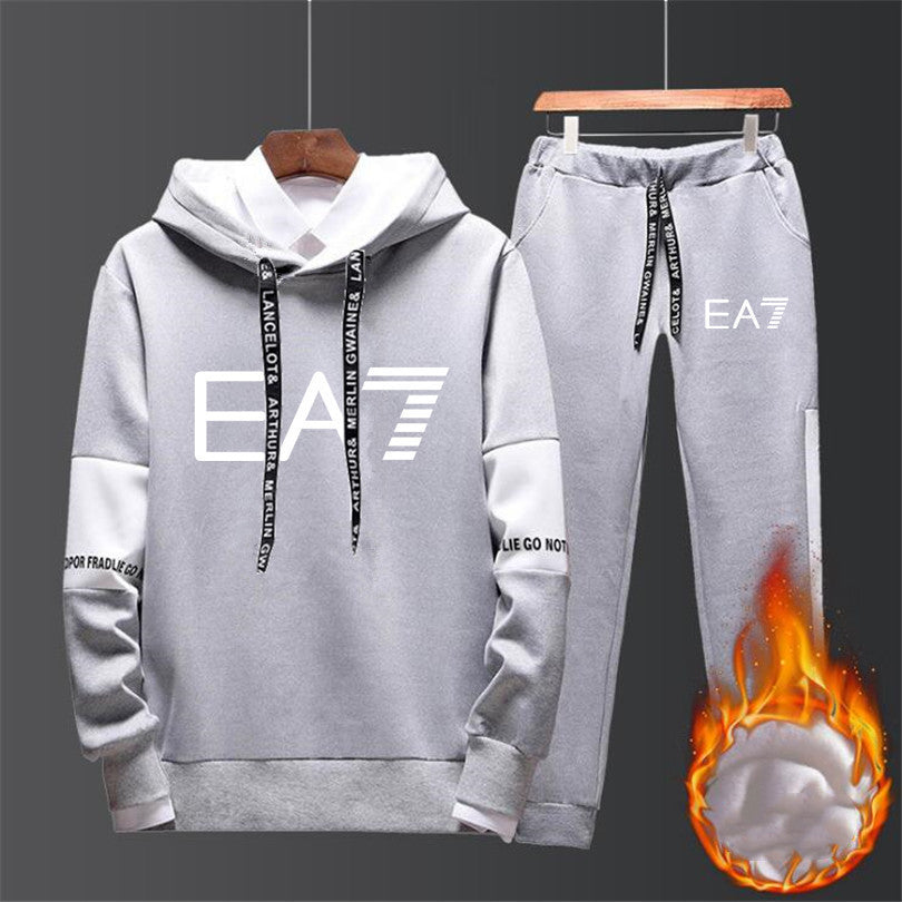 Hoodie and parts set with EA7 branding on the background