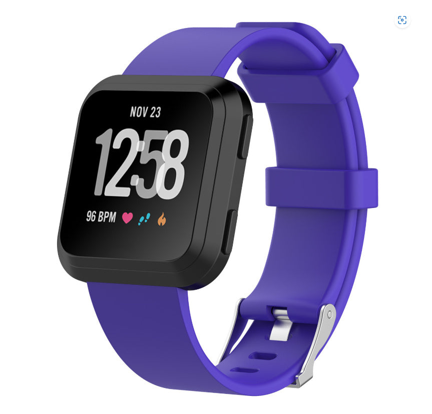 Smartwatch with a purple band on a white background