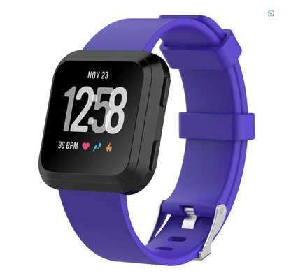 Smartwatch with a purple band on a white background