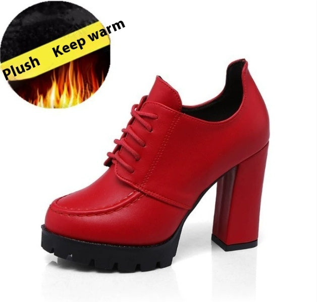 Red high-heeled shoe with plush and warm feature highlighted.