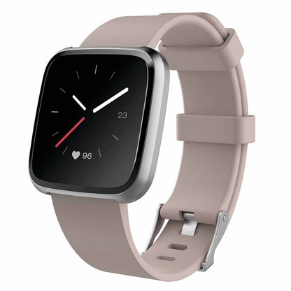 Smartwatch with a pink band on a white background