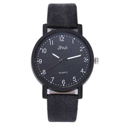 Black wristwatch with 'Jhui' branding on a white background