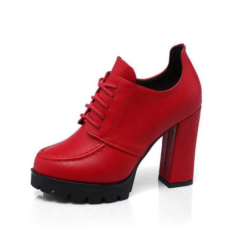 Red high-heeled shoe on a white background