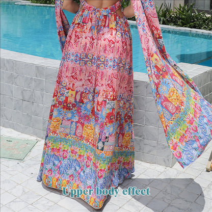 Colorful floral dress with a pool in the background