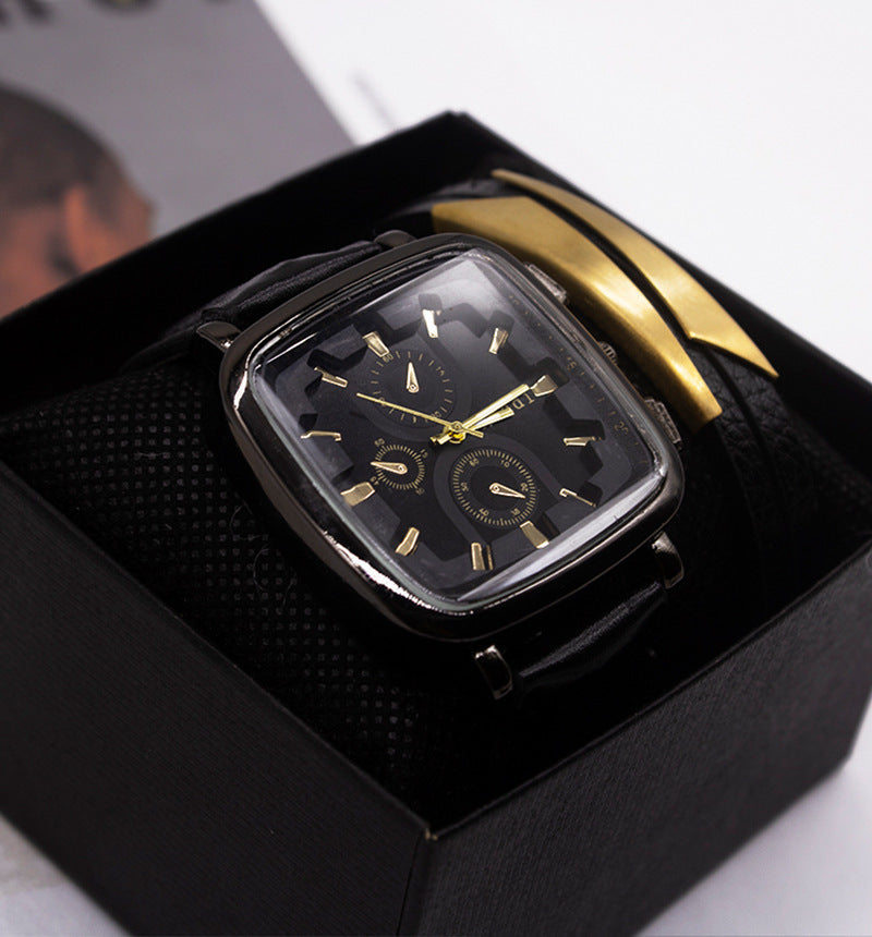 Black and gold watch in a box