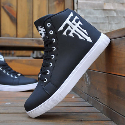 Black high-top sneakers with white sole on a wooden surface