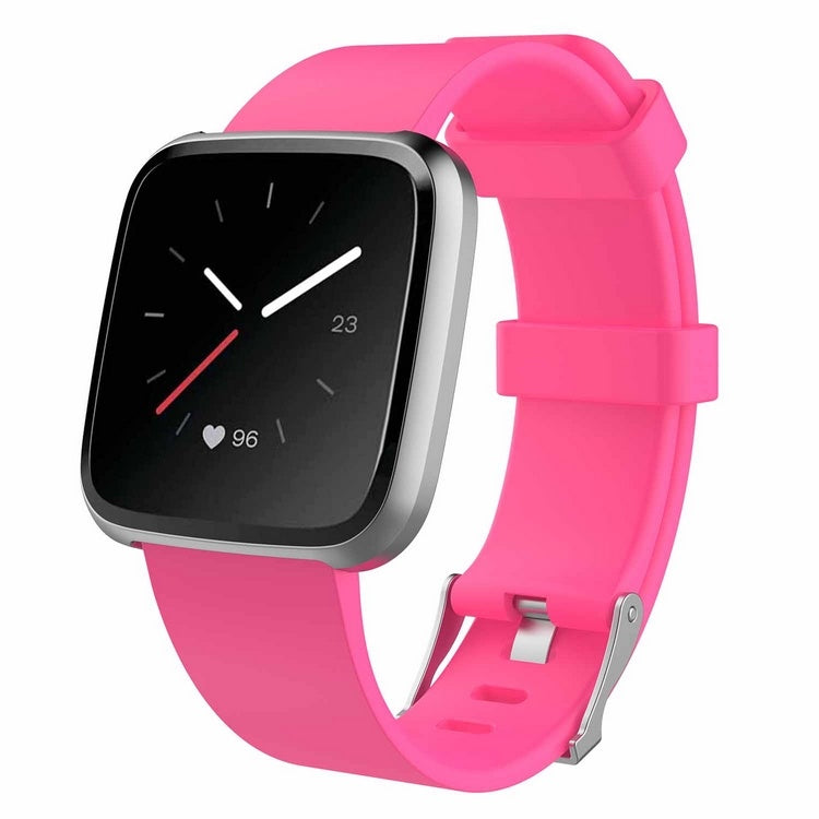 Smartwatch with a pink band on a white background