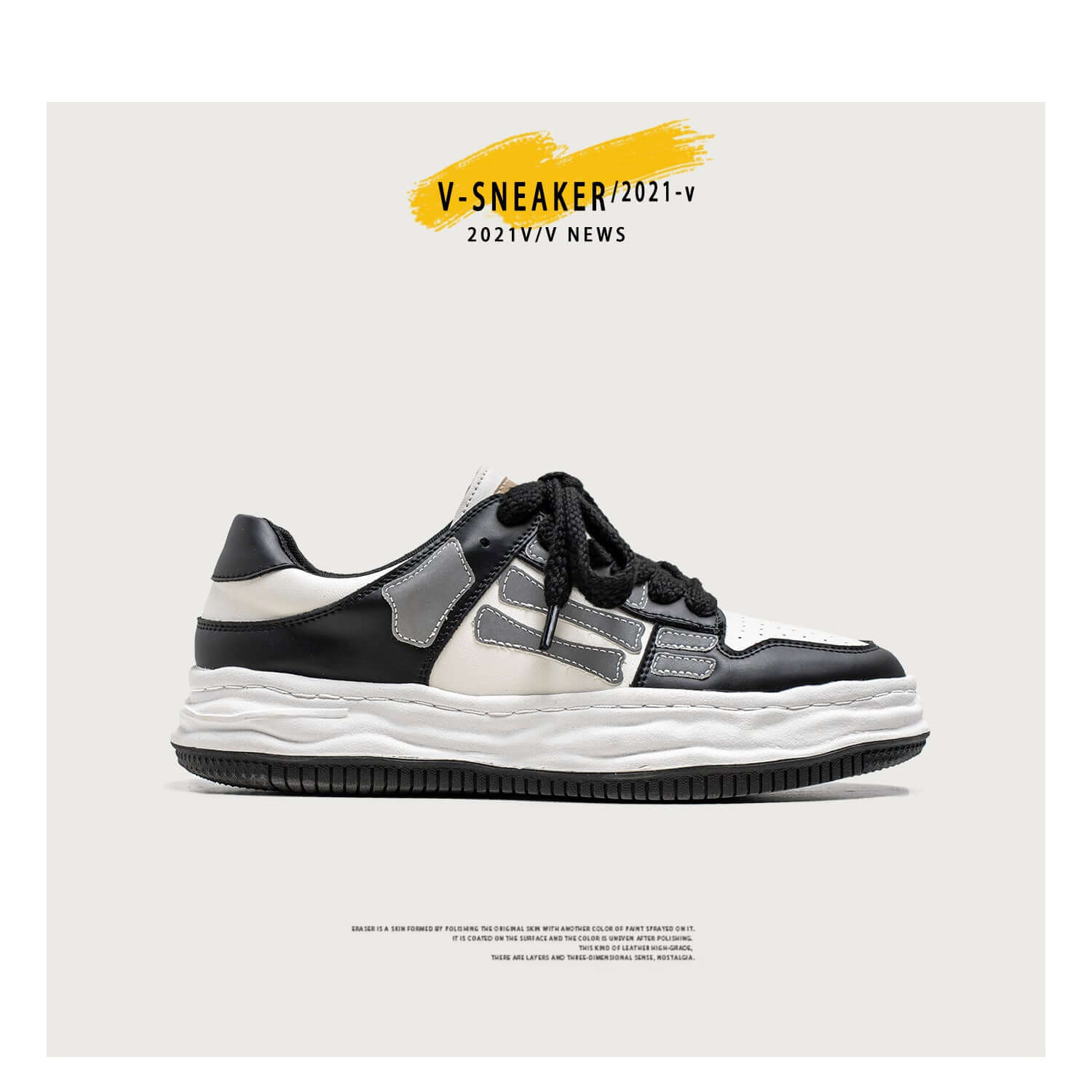 Black and white sneaker with gray accents on a white background, featuring 'V-SNEAKER/2021-V' text.