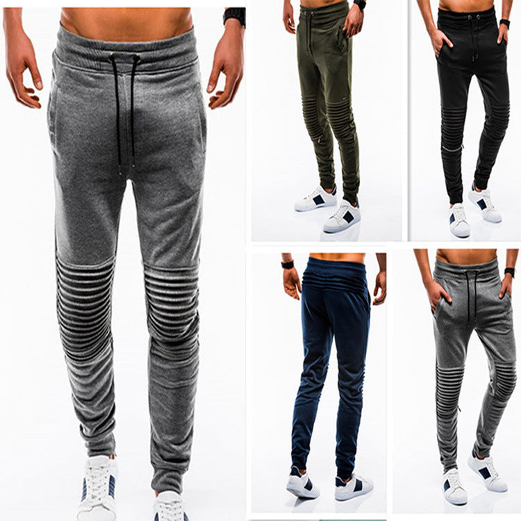 Collection of men's jogger pants in various colors and styles.