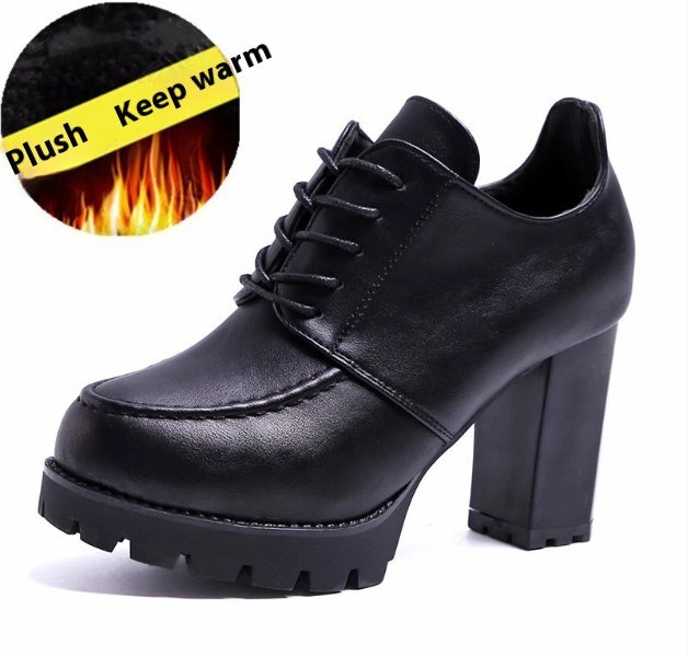 Black leather shoe with a thick block heel on a white background, featuring text 'Plush Keep warm'.