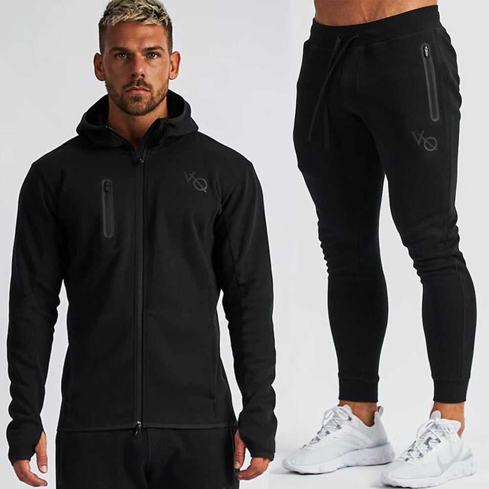Black tracksuit with brand logo on a white background