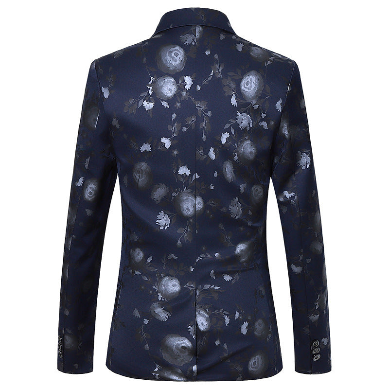 Navy blue floral patterned jacket on a white background
