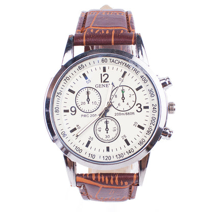 Wristwatch with brown leather strap and white dial on a white background