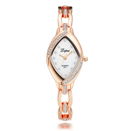 Rose gold watch with white face on a white background