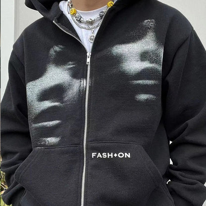 Black hoodie with 'FASHION' logo on a neutral background