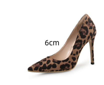 Leopard print high heel shoe with a 6cm heel measurement on a white background