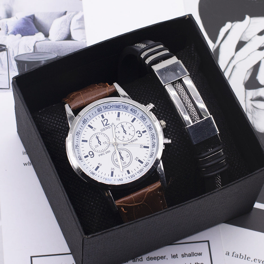 Wristwatch with brown leather strap and silver case in a black box